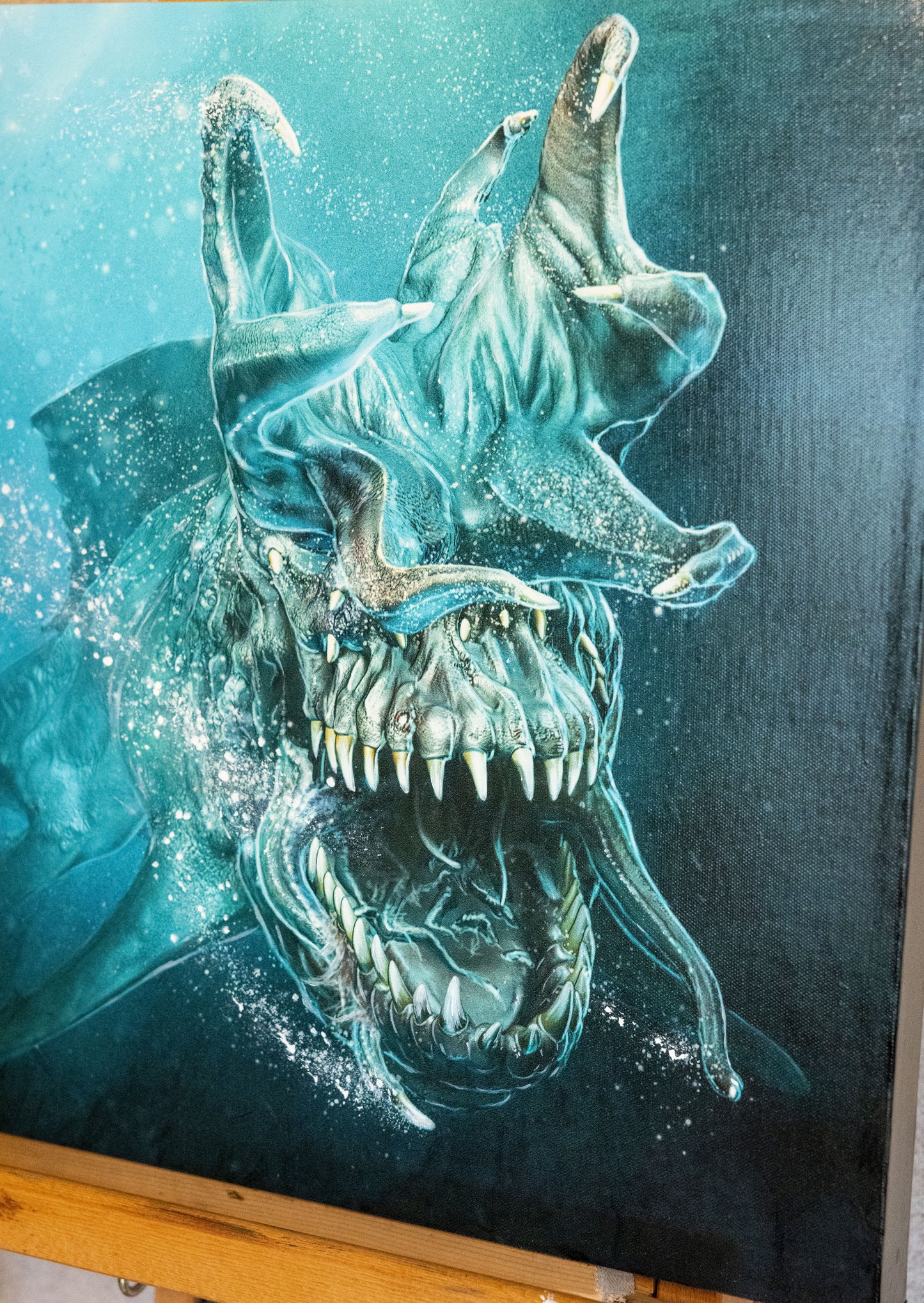 Another close-up of the shark's head on the canvas.