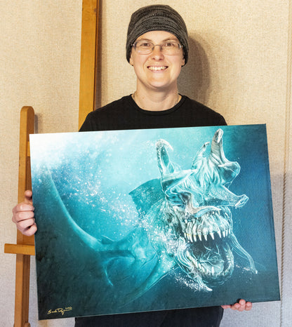 Sarah Dahlinger posing with this canvas. Her signature is in the bottom left corner, written in gold.