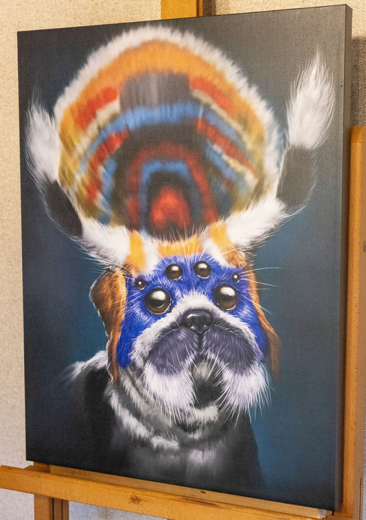 A picture of the canvas resting on the easel. This pug has fur akin to a spider, with eyes to match. Its head feathers out with orange, black, red, and blue into a mesmerizing display.