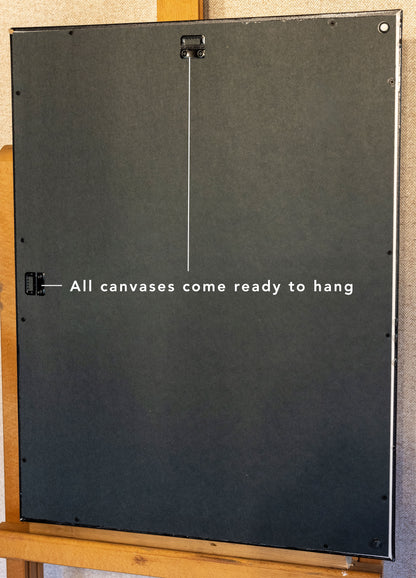 A photo of the canvas back, showing the hanging functions. Text reads, "all canvases come ready to hang."