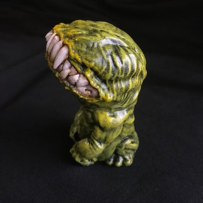 The same creature, from the side. The texture is ribbed and there's a slight shine from reflection.